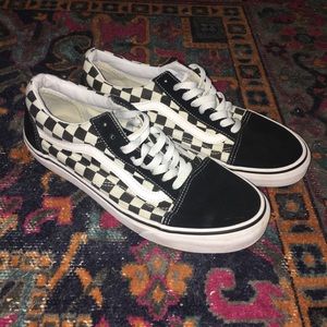 Checkered black and white gently used Vans